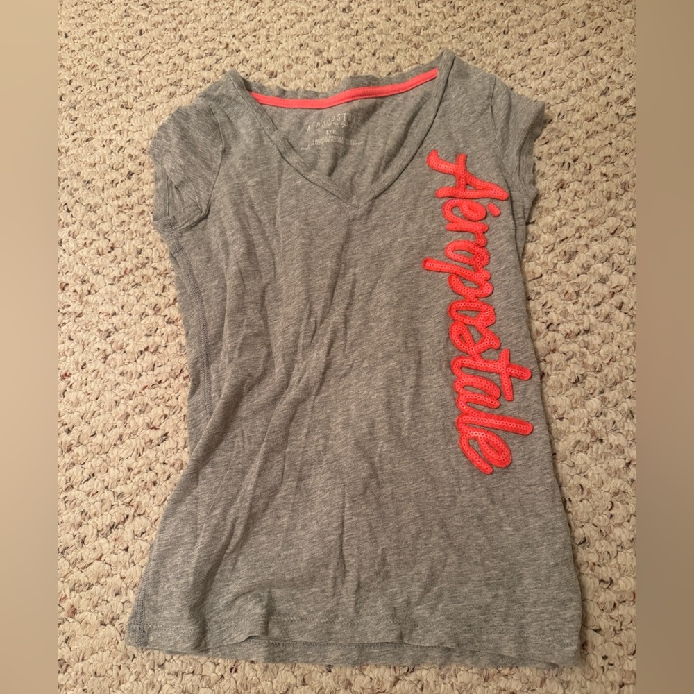 LIKE NEW JUNIORS AEROPOSTALE SMALL SHORT SLEEVE GRAY SHIRT WITH LOGO IN ORANGE